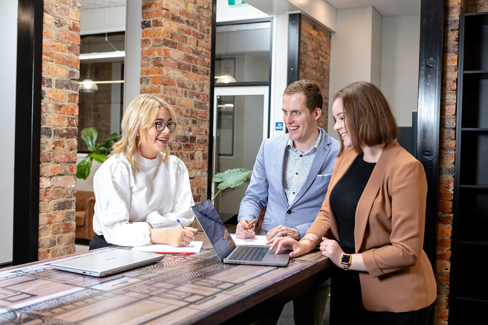 Marketing team collaborating in an office