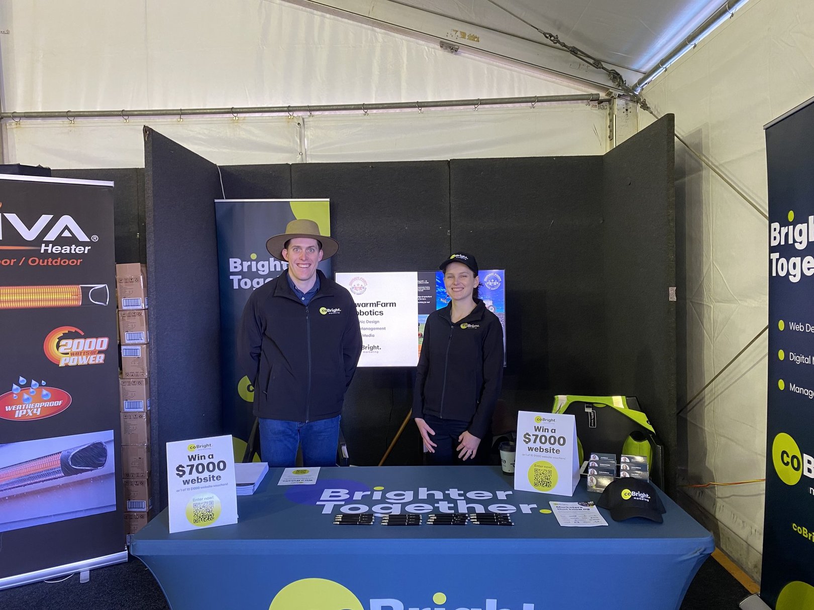 CoBright members stand in the CoBright stall at the FarmFest Event