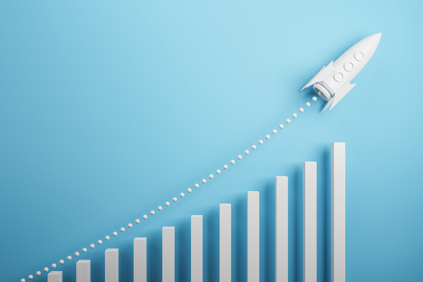 project concept with white rocket flying up with dotted trajectory above light growth graph on blue background