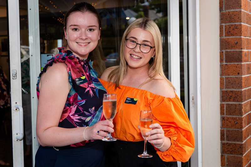 Caitlin and Sinead drinking wine together at the CoBright Soiree